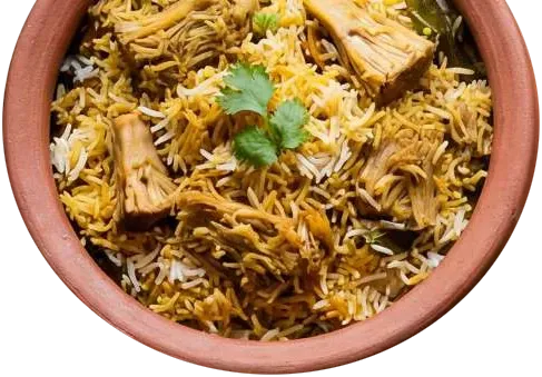 Biryani topped with coriander in a terracotta pot