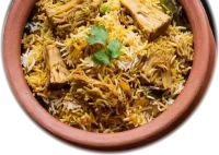 Biryani topped with coriander in a terracotta pot